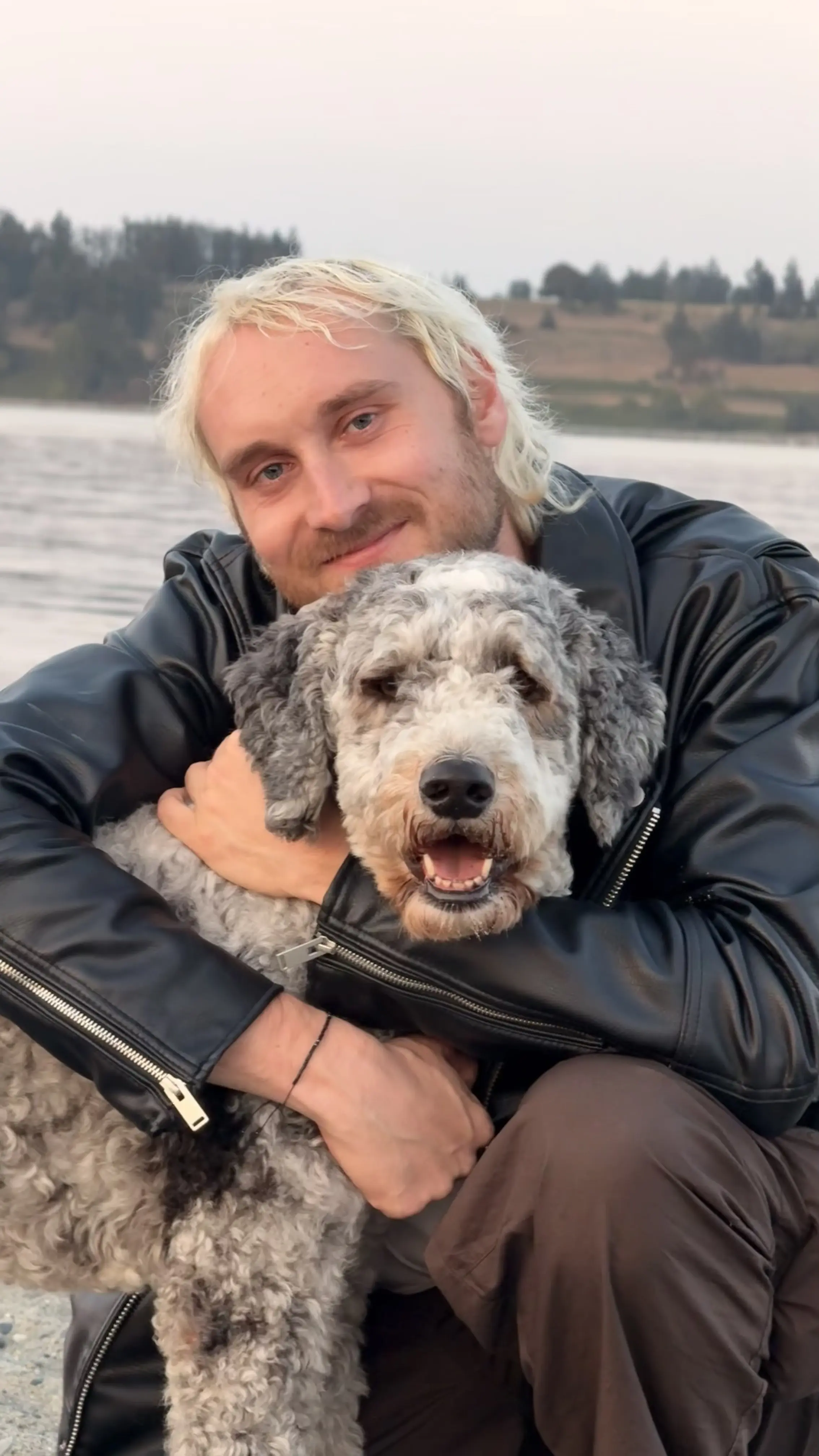Nick Berns with his dog on Auckland beach